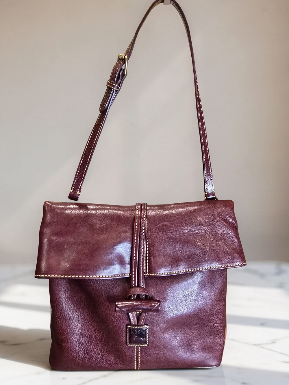 Dooney & Bourke Florentine Toggle Crossbody Bag In Bordeaux